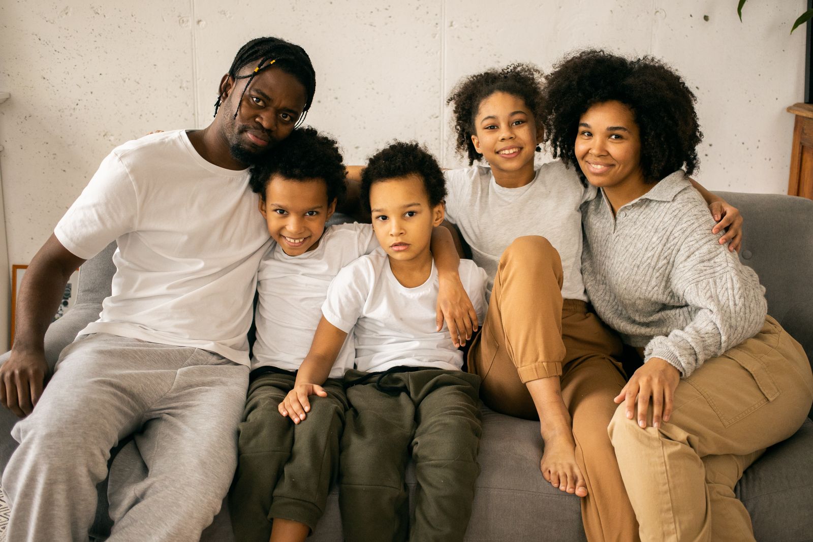 A Black family spending time together at home