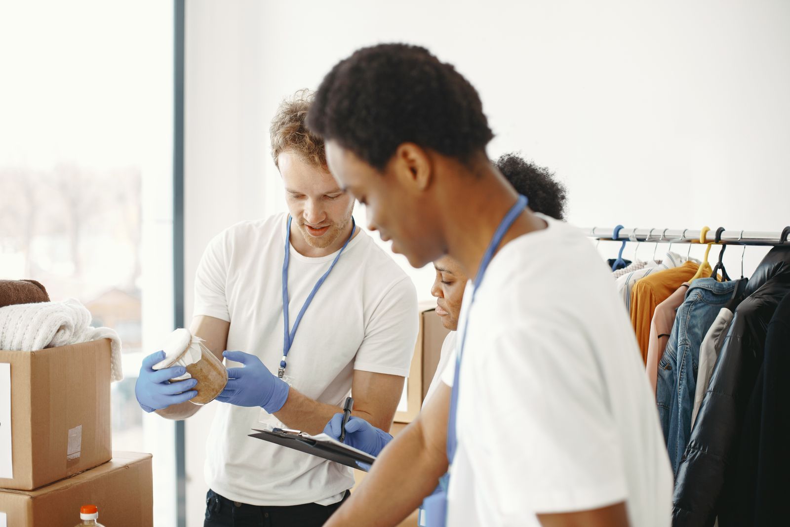 People working together to prepare donations
